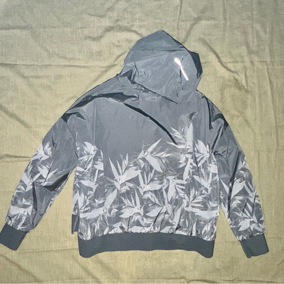 CK Light gray wind/rain jacket. It’s in good shape with no damage. - Picture 2 of 2